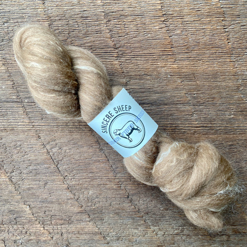 60% Moorit Merino "Sophie" 30% Suri Alpaca "Wilma" 10% Tussah Silk Roving